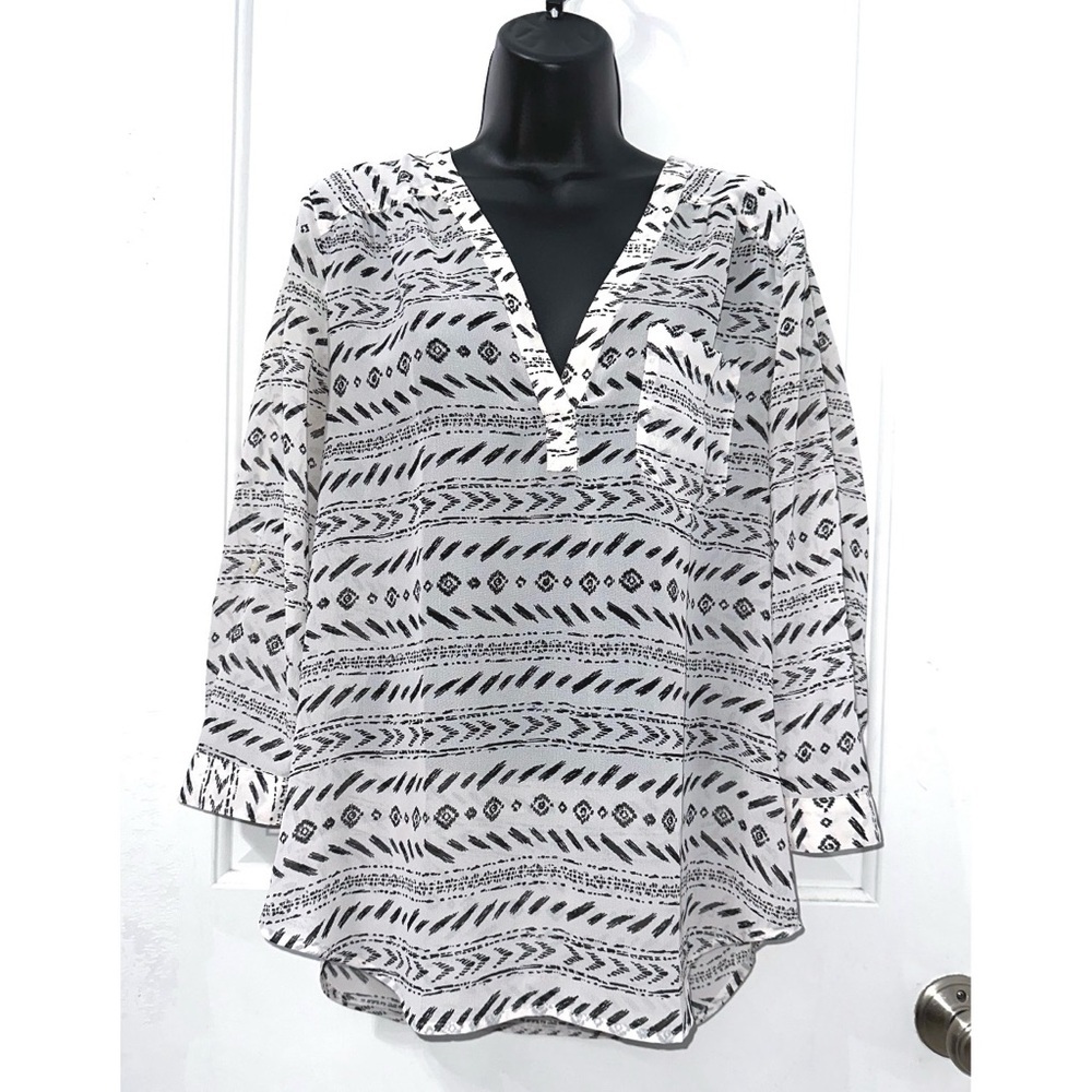 Maurice’s women's blouse in white with a black print, v-neck, and 3/4 sleeves